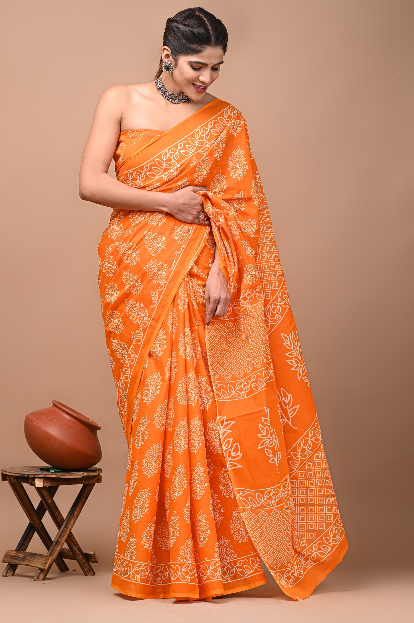 Orange block print cotton saree